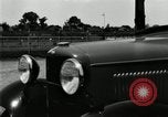 Image of Ford stake bed truck is demonstrated in operation United States USA, 1932, second 27 stock footage video 65675029688