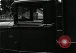 Image of Ford stake bed truck is demonstrated in operation United States USA, 1932, second 31 stock footage video 65675029688