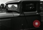 Image of Ford stake bed truck is demonstrated in operation United States USA, 1932, second 35 stock footage video 65675029688