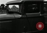 Image of Ford stake bed truck is demonstrated in operation United States USA, 1932, second 38 stock footage video 65675029688