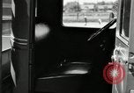 Image of Ford stake bed truck is demonstrated in operation United States USA, 1932, second 42 stock footage video 65675029688