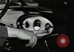 Image of Ford stake bed truck is demonstrated in operation United States USA, 1932, second 58 stock footage video 65675029688