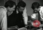 Image of Time journalists sort pictures New York City USA, 1939, second 1 stock footage video 65675029699