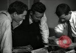 Image of Time journalists sort pictures New York City USA, 1939, second 3 stock footage video 65675029699