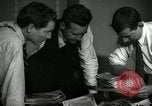 Image of Time journalists sort pictures New York City USA, 1939, second 4 stock footage video 65675029699