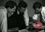 Image of Time journalists sort pictures New York City USA, 1939, second 5 stock footage video 65675029699