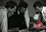 Image of Time journalists sort pictures New York City USA, 1939, second 6 stock footage video 65675029699