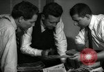 Image of Time journalists sort pictures New York City USA, 1939, second 8 stock footage video 65675029699