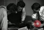Image of Time journalists sort pictures New York City USA, 1939, second 10 stock footage video 65675029699