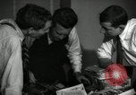 Image of Time journalists sort pictures New York City USA, 1939, second 13 stock footage video 65675029699