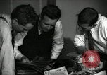 Image of Time journalists sort pictures New York City USA, 1939, second 17 stock footage video 65675029699