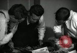 Image of Time journalists sort pictures New York City USA, 1939, second 19 stock footage video 65675029699