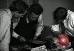 Image of Time journalists sort pictures New York City USA, 1939, second 22 stock footage video 65675029699