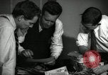 Image of Time journalists sort pictures New York City USA, 1939, second 25 stock footage video 65675029699