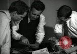 Image of Time journalists sort pictures New York City USA, 1939, second 26 stock footage video 65675029699