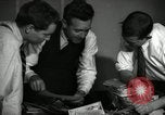 Image of Time journalists sort pictures New York City USA, 1939, second 27 stock footage video 65675029699