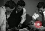 Image of Time journalists sort pictures New York City USA, 1939, second 30 stock footage video 65675029699