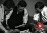 Image of Time journalists sort pictures New York City USA, 1939, second 34 stock footage video 65675029699