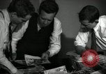 Image of Time journalists sort pictures New York City USA, 1939, second 36 stock footage video 65675029699