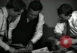 Image of Time journalists sort pictures New York City USA, 1939, second 37 stock footage video 65675029699