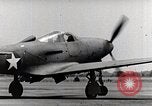 Standbild P-39 Airacobra Ausübung Flugzeuge United States USA, 1942, aus Sekunde 11 historischem Filmmaterial Videoclip 65675029757