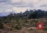 Image of clearing vegetation Bein Hoa South Vietnam, 1967, second 36 stock footage video 65675029758