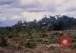 Image of clearing vegetation Bein Hoa South Vietnam, 1967, second 37 stock footage video 65675029758