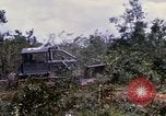 Image of clearing vegetation Bein Hoa South Vietnam, 1967, second 43 stock footage video 65675029758