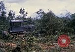 Image of clearing vegetation Bein Hoa South Vietnam, 1967, second 49 stock footage video 65675029758
