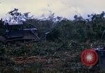 Image of clearing vegetation Bein Hoa South Vietnam, 1967, second 62 stock footage video 65675029758