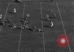 Immagine di Football americano New Haven Connecticut USA, 1934, secondo 30 filmato di repertorio 65675029777