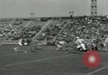 Immagine di Football americano New Haven Connecticut USA, 1934, secondo 42 filmato di repertorio 65675029777