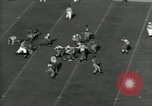 Immagine di Football americano Palo Alto California USA, 1934, secondo 57 filmato di repertorio 65675029778