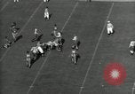 Immagine di Football americano Palo Alto California USA, 1934, secondo 58 filmato di repertorio 65675029778