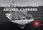 Image of aircraft carrier fire fighting United States USA, 1960, second 6 stock footage video 65675029807