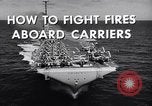 Image of aircraft carrier fire fighting United States USA, 1960, second 7 stock footage video 65675029807