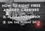 Image of aircraft carrier fire fighting United States USA, 1960, second 14 stock footage video 65675029807