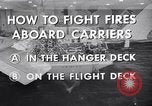 Image of aircraft carrier fire fighting United States USA, 1960, second 16 stock footage video 65675029807
