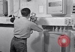 Image of aircraft carrier fire fighting United States USA, 1960, second 53 stock footage video 65675029807