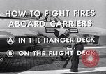 Image of controlling deck fire United States USA, 1960, second 5 stock footage video 65675029808