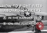 Image of controlling deck fire United States USA, 1960, second 6 stock footage video 65675029808
