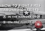 Image of controlling deck fire United States USA, 1960, second 7 stock footage video 65675029808