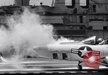 Image of controlling deck fire United States USA, 1960, second 38 stock footage video 65675029809