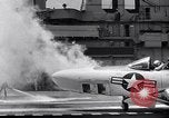 Image of controlling deck fire United States USA, 1960, second 40 stock footage video 65675029809