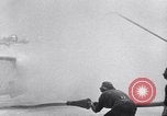 Image of controlling deck fire United States USA, 1960, second 57 stock footage video 65675029809