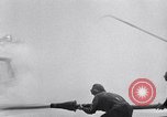 Image of controlling deck fire United States USA, 1960, second 58 stock footage video 65675029809