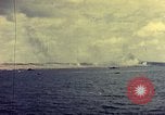 Image of bombardment of shoreline Iwo Jima, 1945, second 9 stock footage video 65675029810