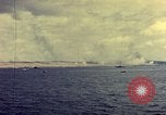 Image of bombardment of shoreline Iwo Jima, 1945, second 10 stock footage video 65675029810