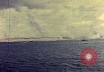Image of bombardment of shoreline Iwo Jima, 1945, second 13 stock footage video 65675029810