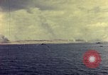 Image of bombardment of shoreline Iwo Jima, 1945, second 16 stock footage video 65675029810